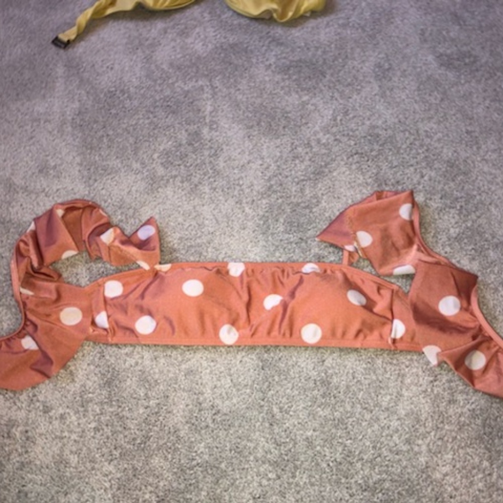 Coral color, white polka dot swim top!